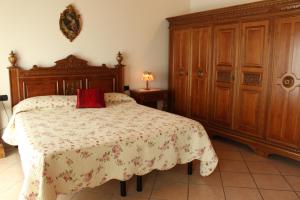 Postel nebo postele na pokoji v ubytování Agriturismo Daniela