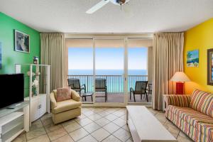 a living room with a view of the ocean at Majestic Beach Towers 2013 in Panama City Beach