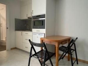 Kuchyňa alebo kuchynka v ubytovaní Apartamentos OLIVA