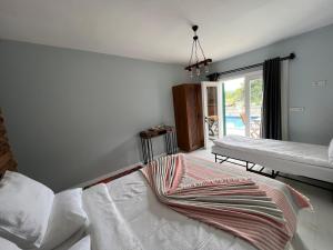 Postel nebo postele na pokoji v ubytování ALAÇATI XL LUXURY HOTEL