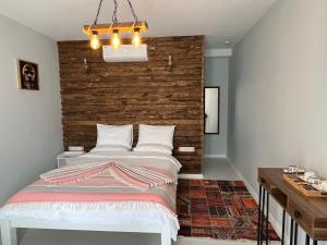 Postel nebo postele na pokoji v ubytování ALAÇATI XL LUXURY HOTEL