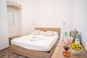 Postel nebo postele na pokoji v ubytování Il Germoglio