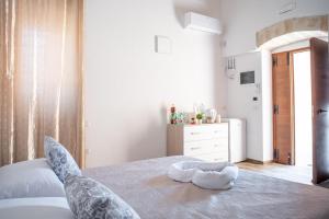 Postel nebo postele na pokoji v ubytování Il Germoglio