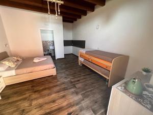 Postel nebo postele na pokoji v ubytování Il Germoglio