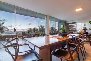 Khu vực ghế ngồi tại Luxo à Beira Mar - Mansão Exclusiva por Carpediem