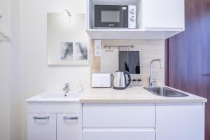 Una cocina o zona de cocina en Hyper Central - NEW - Very Small Studio