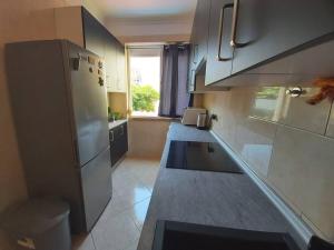 Kuchyň nebo kuchyňský kout v ubytování WYD Appartment T2 - Algés 2000 eur