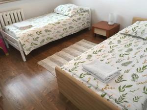 Łóżko lub łóżka w pokoju w obiekcie Apartament Centrum