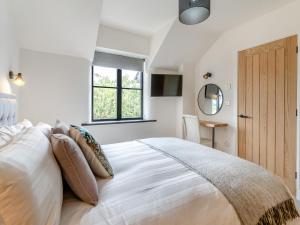 Postel nebo postele na pokoji v ubytování Just A Cottage