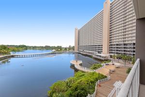 a view of a river in front of a building at Laketown Wharf 335! 1 BD, 2 Bathroom with Amazing Amenities in Panama City Beach