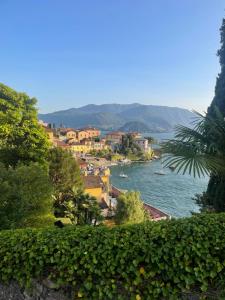 a view of a river with houses and a city at Varenna by Foot (no Taxi / Car needed) in Varenna