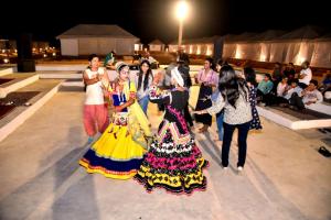 a group of women walking down the runway at a fashion show at Sky View in Jaisalmer