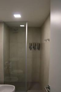 Ένα μπάνιο στο Departamento 1 Habitación Completamente Equipado