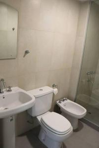 Ένα μπάνιο στο Departamento 1 Habitación Completamente Equipado +9 φωτογραφίες