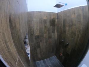 an overhead view of a bathroom with a shower at Bacalar in Bacalar
