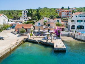 an aerial view of a town with a body of water at Apartments Novo Mulo in Tivat