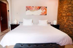 Postel nebo postele na pokoji v ubytování La Violeta HOTEL SPA & CHILL OUT