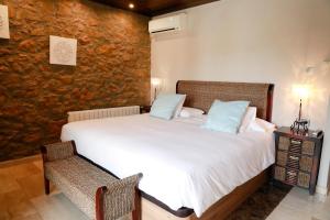 Postel nebo postele na pokoji v ubytování La Violeta HOTEL SPA & CHILL OUT