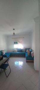 Istumisnurk majutusasutuses Appartement centre oued laou avec piscine été
