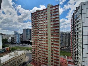 a view of a tall building in a city at Tu mejor opción en Mar del Plata. Cerca de todo. in Mar del Plata