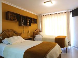 Hotel San Felipe客房内的一张或多张床位