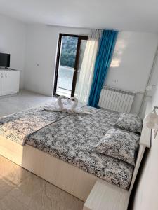 Postel nebo postele na pokoji v ubytování Villa Adam