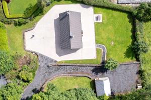 an overhead view of a building on a field at Bradleys Cottage Creeslough in Creeslough