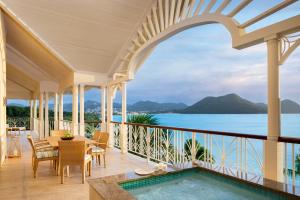 a view of the ocean from a house with a swimming pool at The Landings Resort and Spa - All Suites in Gros Islet