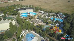 an aerial view of a water park with a roller coaster at Attico al mare Zoomarine a 40 minuti da Roma in Torvaianica