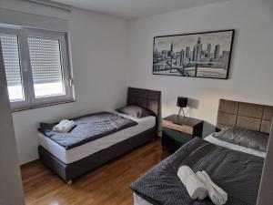 Ένα ή περισσότερα κρεβάτια σε δωμάτιο στο Apartment With Panoramic View
