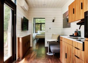 a kitchen with a sink and a counter top at AutoCamp Catskills in Saugerties
