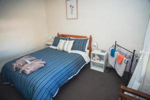 Postel nebo postele na pokoji v ubytování Kooringa Cottage