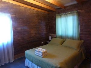 Postel nebo postele na pokoji v ubytování Hostal Solor