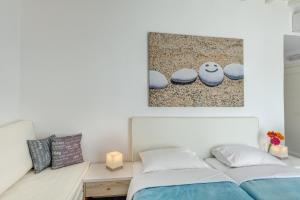 Cama ou camas em um quarto em Makis Place