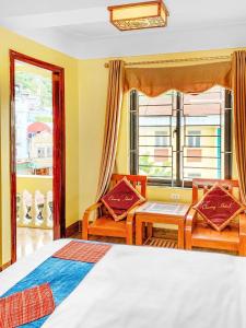 Postel nebo postele na pokoji v ubytování Cherry Hotel