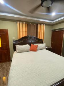 Ein Bett oder Betten in einem Zimmer der Unterkunft Cham's Penthouse