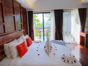 Postel nebo postele na pokoji v ubytování 360 Resort + 77 fotografií