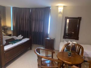 Llit o llits en una habitació de Hotel DarulMakmur Jerantut