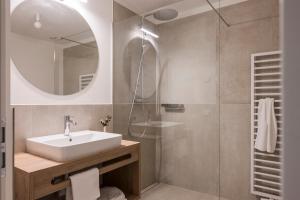 Salle de bains dans l'établissement Astor Apartments