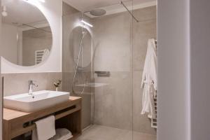 Salle de bains dans l'établissement Astor Apartments