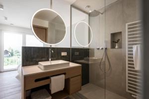 Salle de bains dans l'établissement Astor Apartments