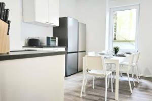 Η κουζίνα ή μικρή κουζίνα στο -CS24- Apartments in Altena - six beds - ALT0102