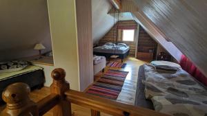 Postel nebo postele na pokoji v ubytování Intsikurmu veski saunamaja - sauna inclusive
