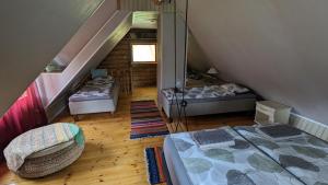Postel nebo postele na pokoji v ubytování Intsikurmu veski saunamaja - sauna inclusive