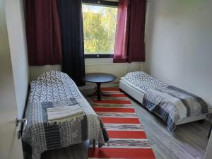 Postel nebo postele na pokoji v ubytování CheapRooms in Tornio city
