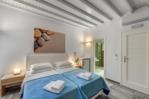 Cama ou camas em um quarto em Makis Place