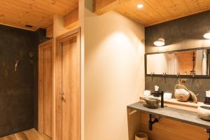 A kitchen or kitchenette at Le Wafo