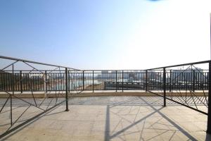 a view from the top of a building with a metal railing at Lake 45 Hotel in Naju