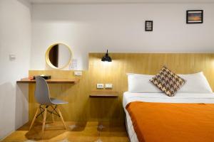 Uma cama ou camas num quarto em 康逸旅宿Comeinn2