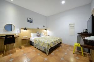 Uma cama ou camas num quarto em 康逸旅宿Comeinn2